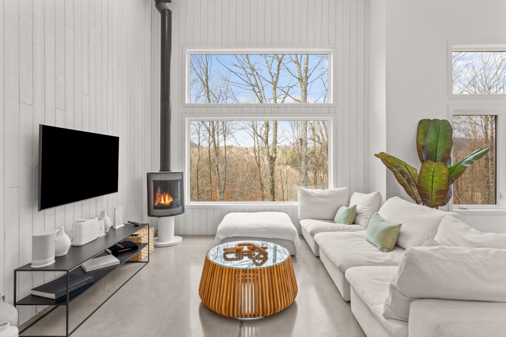 Living room — stone hearth lit, Saturday evening after ski