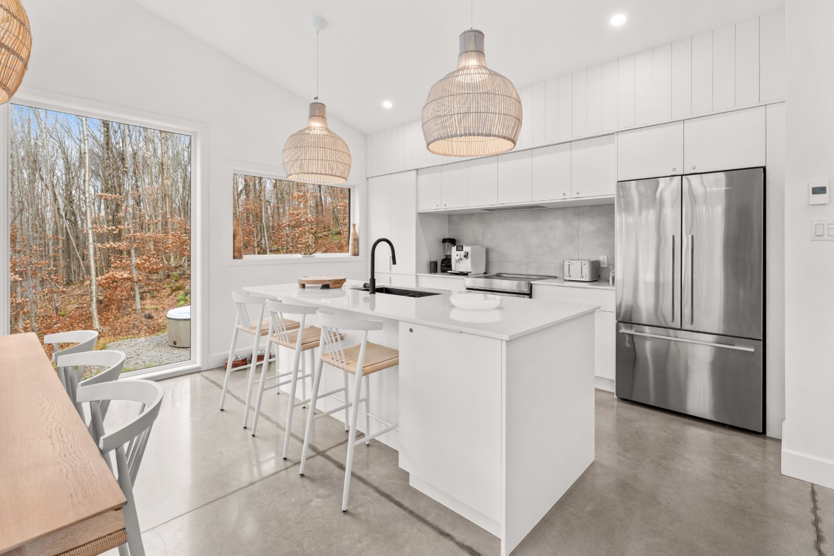 Kitchen, morning light — French press, cutting board with bread crumbs